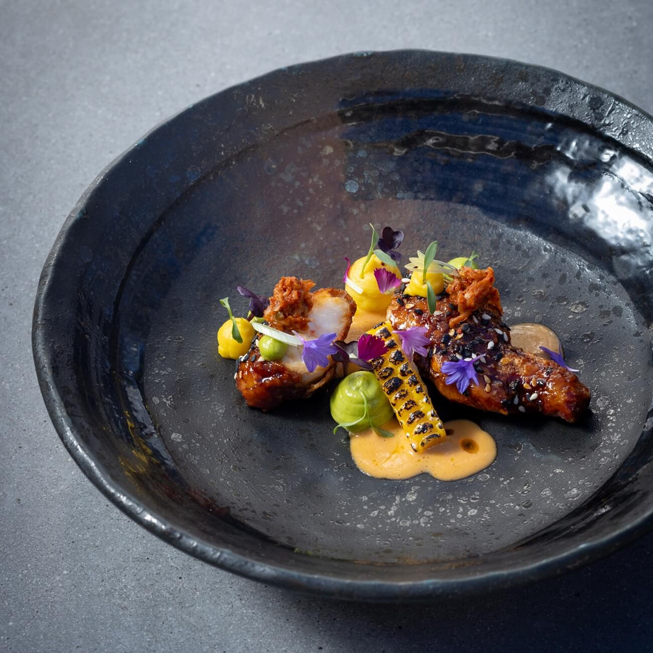 67e53f396c5da-Protege Cuisine (4)@2x A plate of informal yet gourmet-style food